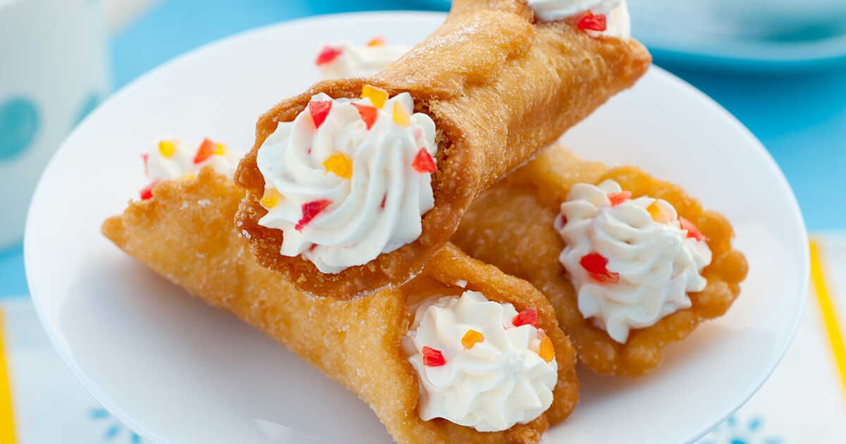 L'art de déguster des cannolis : entre crème et fruits confits